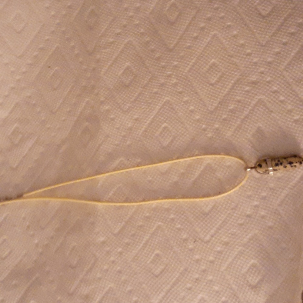 Spotted bullet pendant